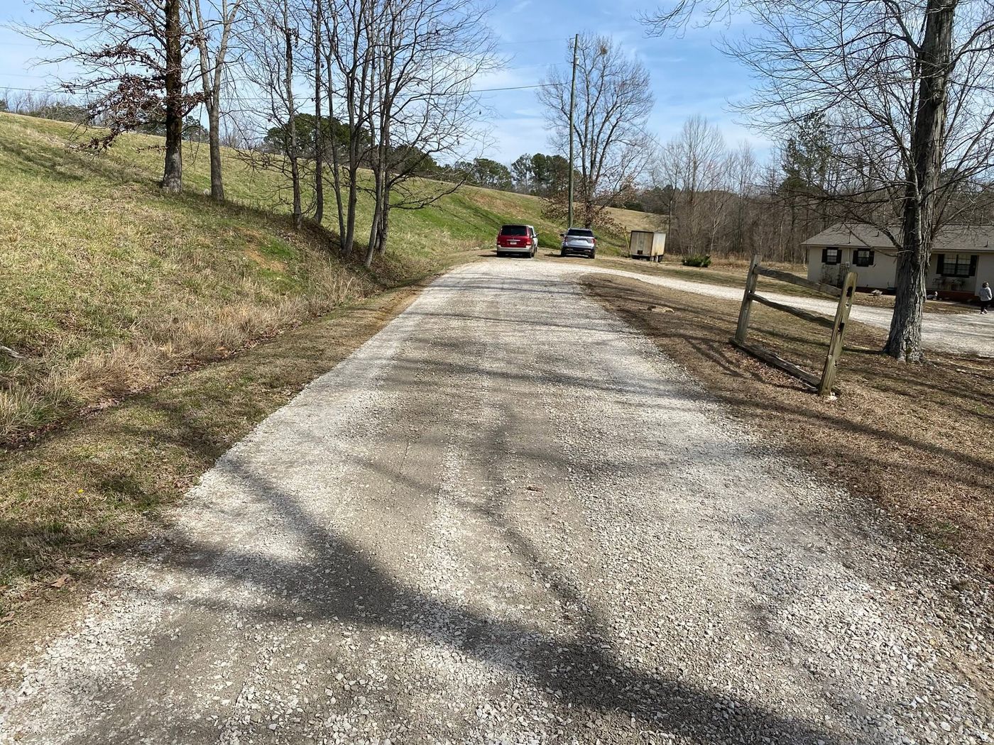 Smooth regraveled driveway after repair