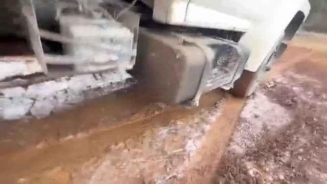 Video: dirt work with truck being loaded in a field