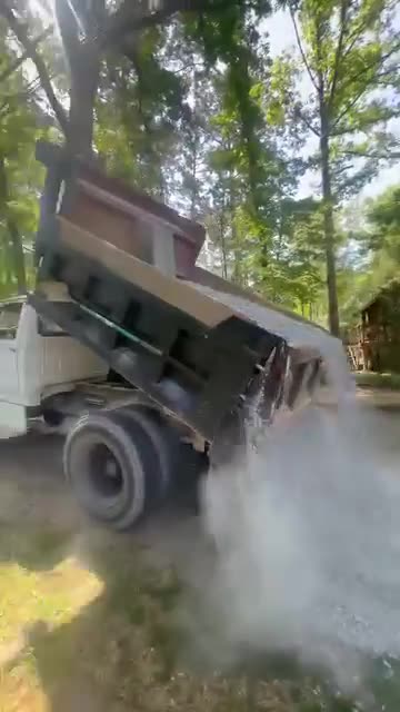 Video: dump truck spreading gravel